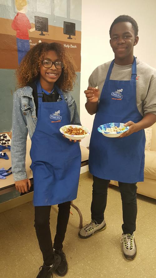 Elba (left) and Amir (right) enjoying a dish they cooked up with Get HYPE Philly!